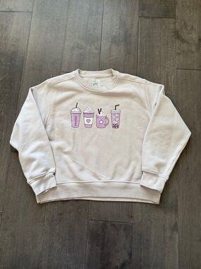 Cream Crewneck Sweatshirt with Lilac Beverage Graphic